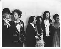 thumbnail link to original b&w photo David Bowie, John Lennon, Simon and Garfunkel, Roberta Flack back stage Grammys 1975