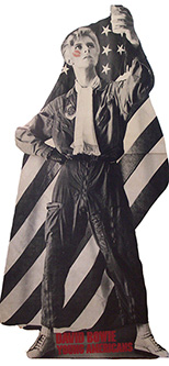 thumbnail link to original David Bowie 1975 full-size card in-store standee, American flag, flying suit, glass of milk aloft.