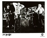 Original 1977 Warner Bros. Records promo still, Sex Pistols filming God Save the Queen video at Marquee Club by Dennis Morris